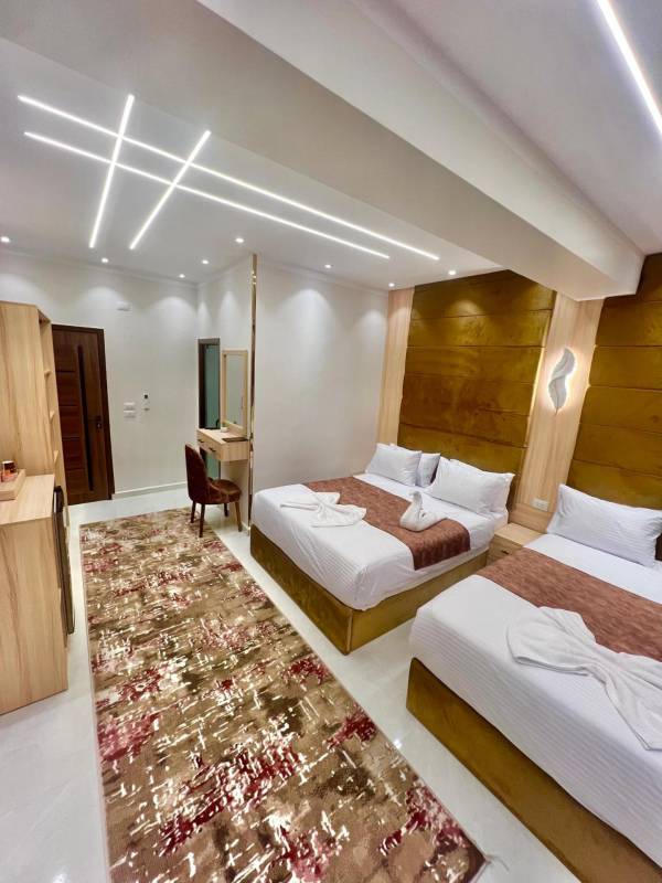 Chambre quadruple avec vue sur les pyramides