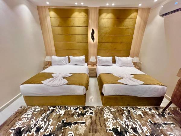 Chambre quadruple de luxe